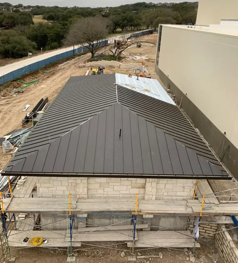 Metal roof new construction with scaffolding in Georgetown